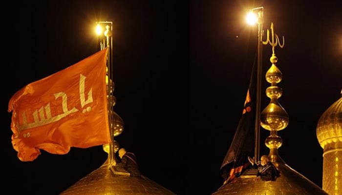 نصب پرچم عزا بر گنبد حرم مطهر امام حسین(ع)