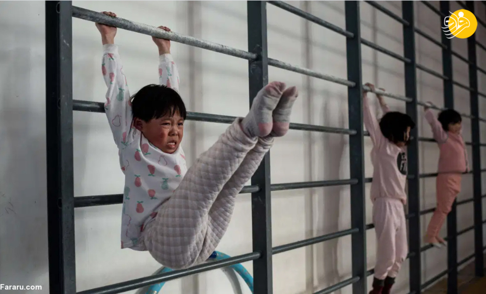 (تصاویر) آموزش سخت کودکان چینی در مدرسه ژیمناستیک