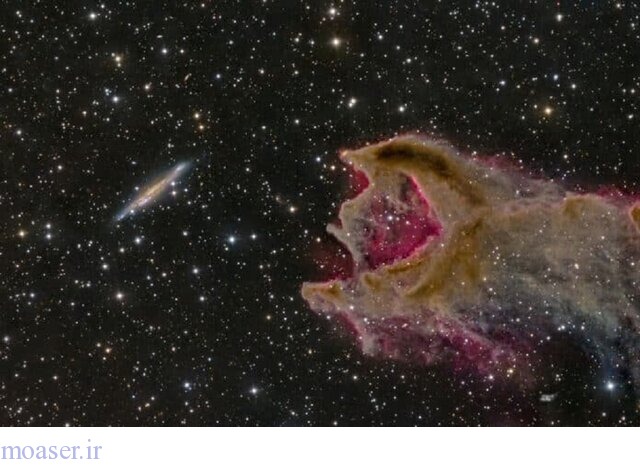 تصویر جذاب ناسا از یک موجود فضاییِ در حال خوردنِ یک کهکشان