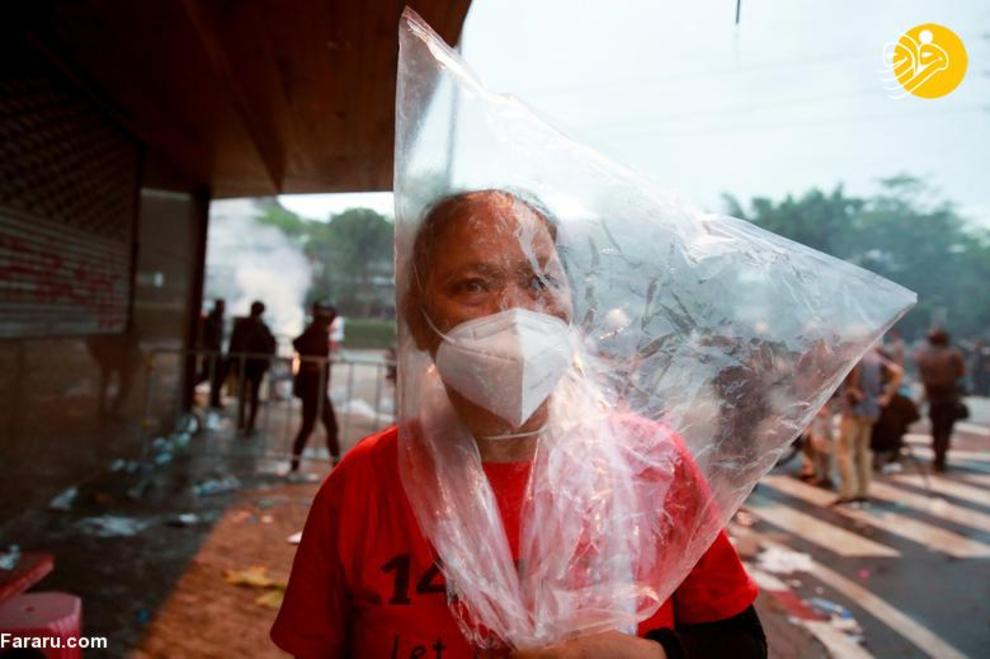 تصاویر | درگیری پلیس با معترضان به نحوه مدیریت کرونا در تایلند