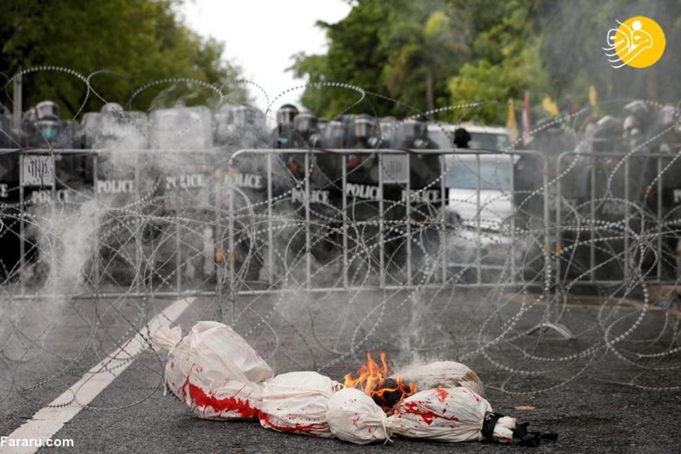 تصاویر | درگیری پلیس با معترضان به نحوه مدیریت کرونا در تایلند